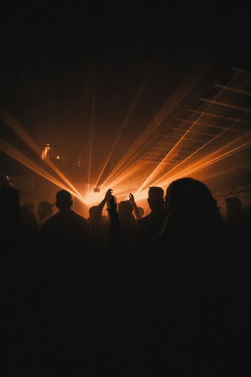 Silhouettes against the stage haze